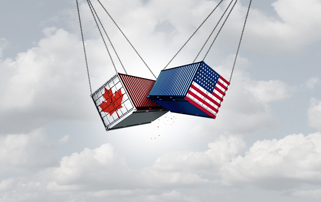 Shipping containers with Canadian and US flags collide mid-air.